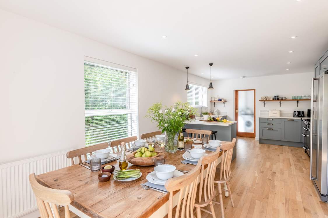 The kitchen/dining-room is wonderfully bright.