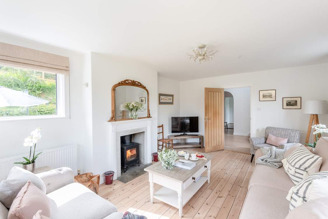 The wood-burner creates a warm and inviting room during those cooler months.