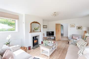 The wood-burner creates a warm and inviting room during those cooler months.