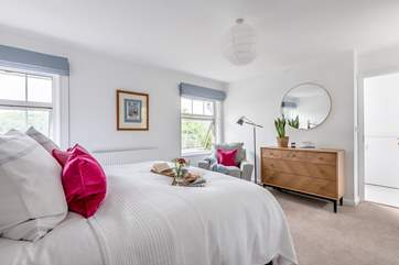 Bedroom two, the main bedroom, has a super-king size bed and a lovely en suite bathroom.