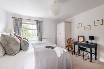 There is a small dressing-table and plenty of storage for your holiday belongings in bedroom three.