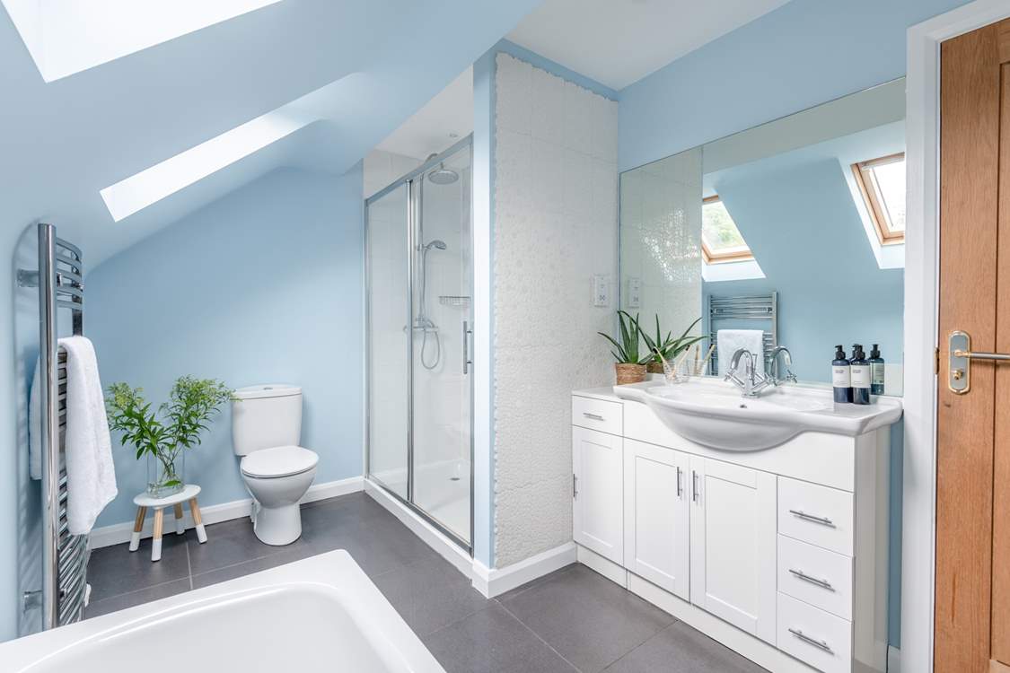 The family bathroom has a bath and separate shower.