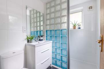 The en suite shower-room with a walk-in shower for bedroom one on the ground floor.