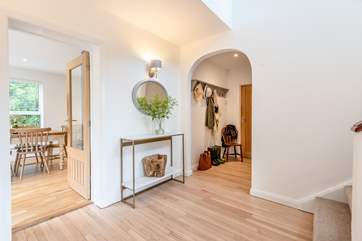 The entrance hallway leading to the kitchen, sitting-rooms and bedroom one.