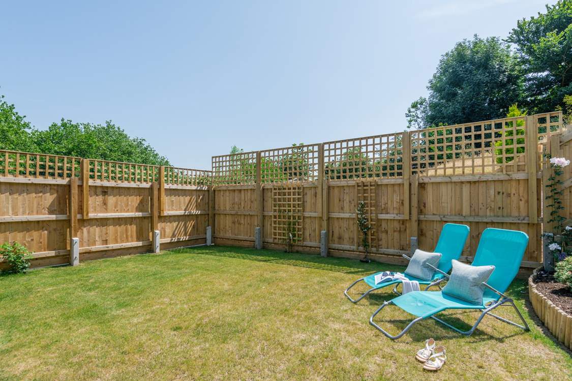 The enclosed garden is perfect for letting the young ones run free.
