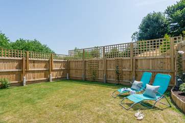 The enclosed garden is perfect for letting the young ones run free.