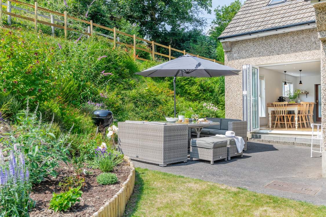 Light the barbecue and enjoy sitting out in the sun for some al fresco dining.
