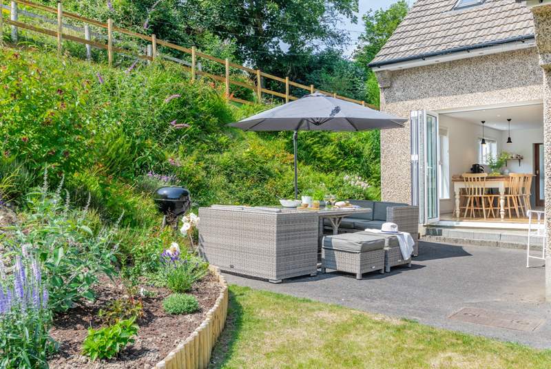 Light the barbecue and enjoy sitting out in the sun for some al fresco dining.
