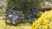 Explore the peaceful grounds and discover the owner's impressive artwork.