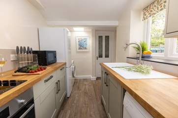 The galley kitchen has everything you need to cook up a feast.