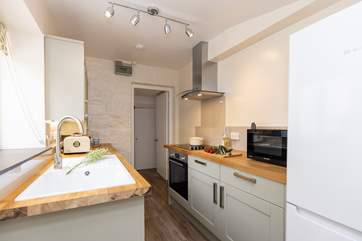 The modern kitchen is light and airy.