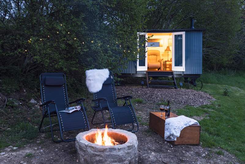 Gather around the fire-pit under the starry skies.