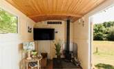 In here, you'll find another wood burner and a smart TV.  - Thumbnail Image