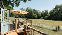 Embrace sun-soaked moments from the raised decking. 