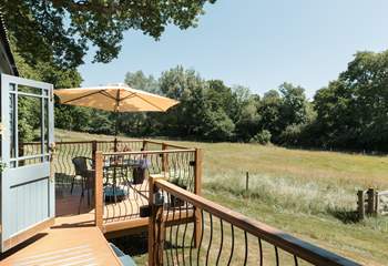 Embrace sun-soaked moments from the raised decking. 