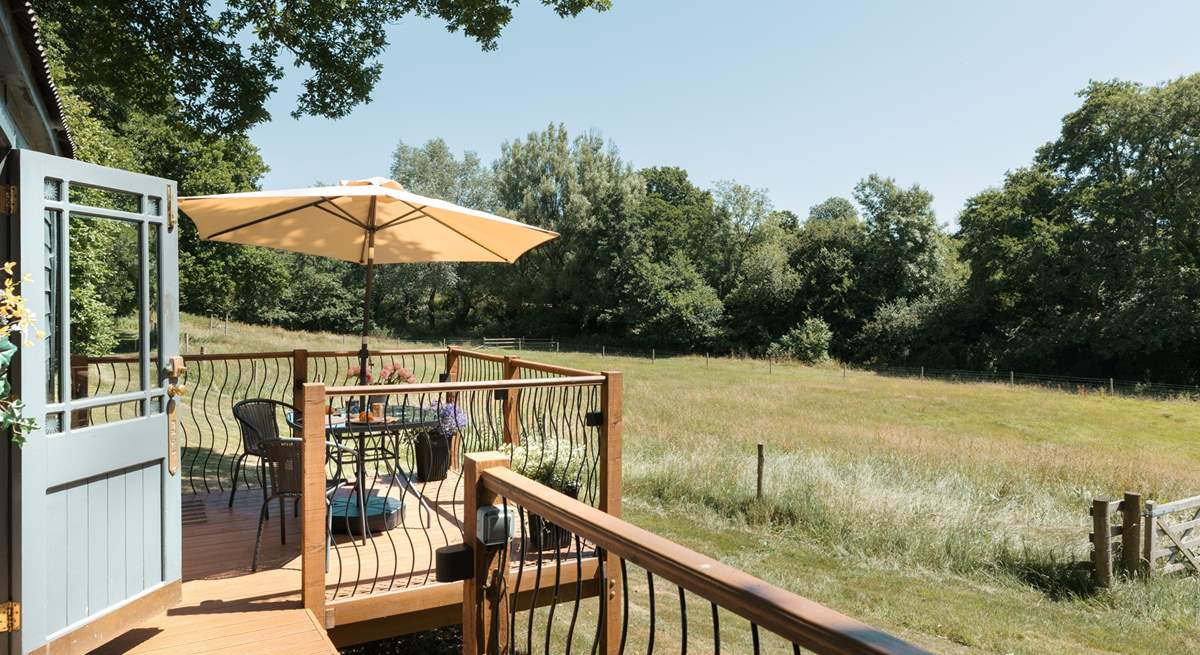 Embrace sun-soaked moments from the raised decking. 