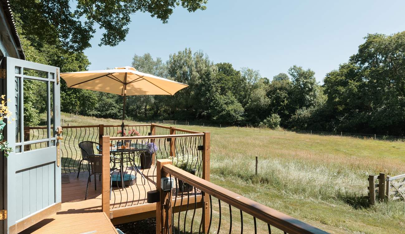 Embrace sun-soaked moments from the raised decking. 