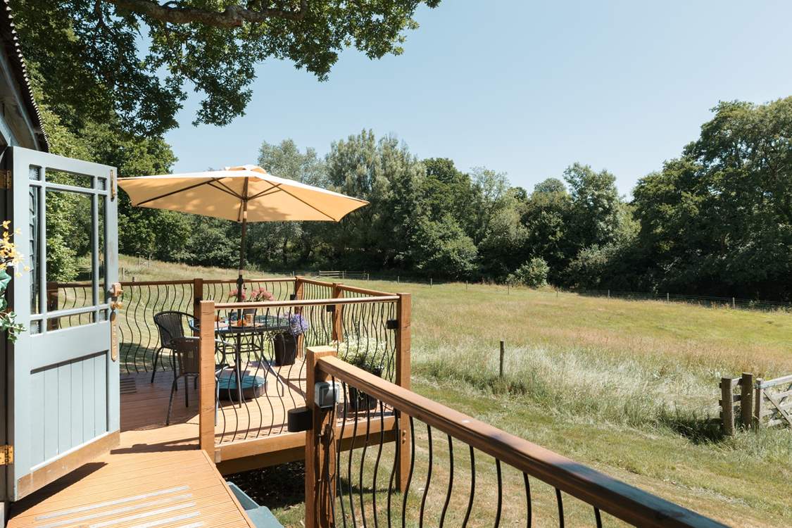 Embrace sun-soaked moments from the raised decking.
