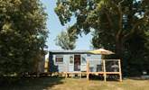 To the left of the hut is where the shower room sits.  - Thumbnail Image