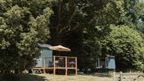 To the right of the main hut, you'll find the relaxation hut, an extra space for you to enjoy. 