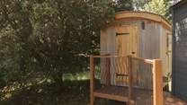 To the left of the hut sits the shower hut, a smaller hut to freshen up in. 