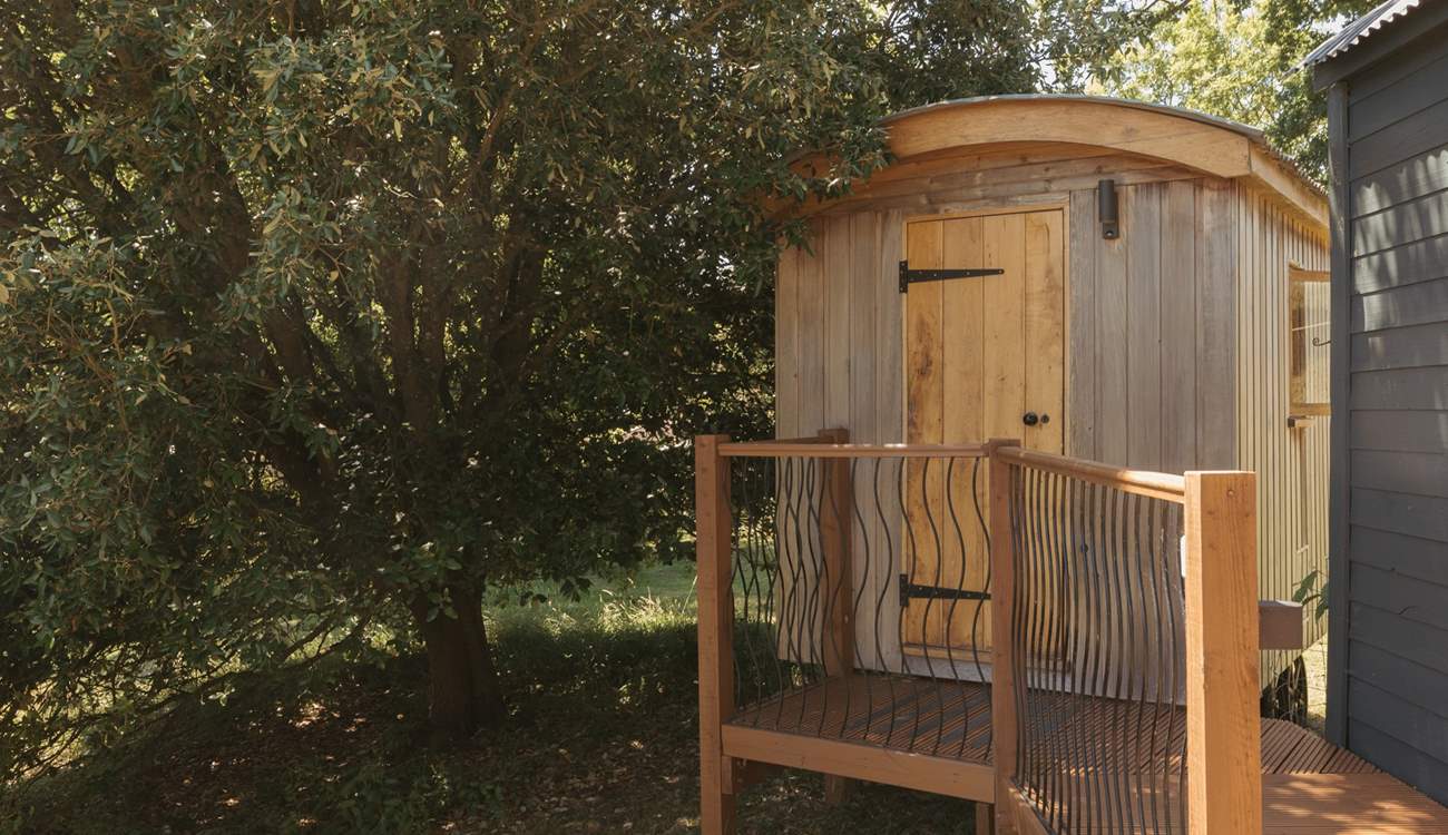 To the left of the hut sits the shower hut, a smaller hut to freshen up in. 