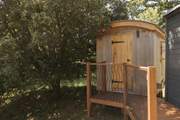 To the left of the hut sits the shower hut, a smaller hut to freshen up in.