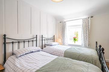 The twin bedroom on the first floor is light and airy.