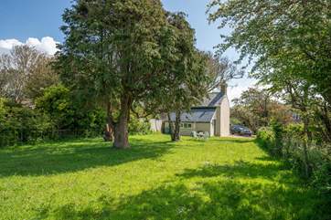 The spacious garden is the perfect place on those summer days.