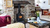 Light up the wood-burner on cooler evenings.