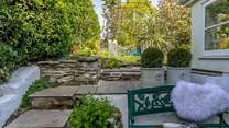Step up to the main garden after a morning coffee on the bench. 