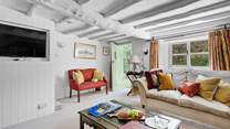 A Smart TV sits snugly inside Holly Cottage's thick walls.