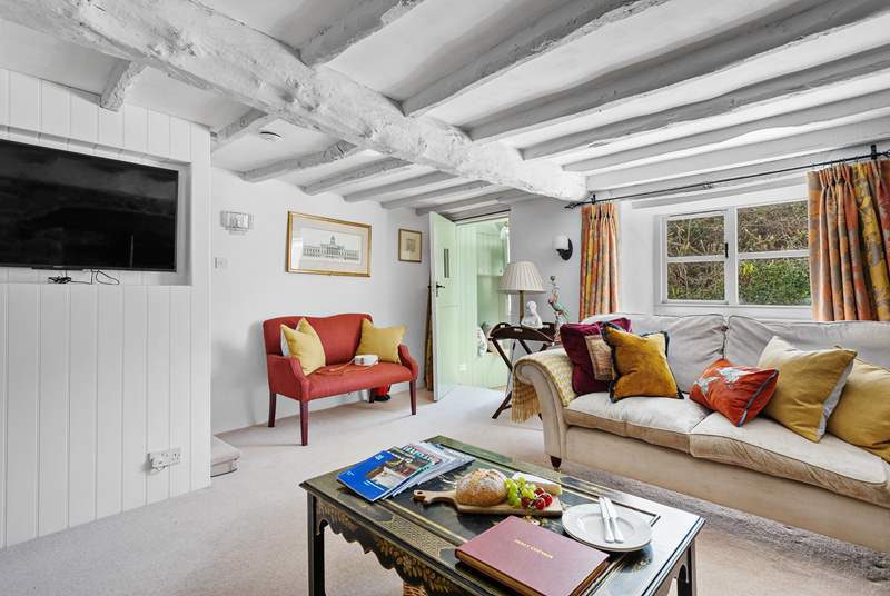 A Smart TV sits snugly inside Holly Cottage's thick walls.
