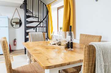 The spiral staircase to the first floor is a fun and quirky feature.