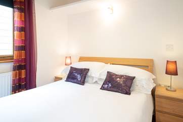 The first double bedroom is cosy and light.