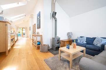 Spend quality time with friends and loved ones in the open plan living-room with kitchen and dining areas.