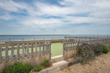 Just opposite The Shack is a boatyard and the owner has kindly allowed guests to access the sea wall via the car park and through the gate (no direct access to the promenade).