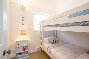 The fourth bedroom located on the second floor overlooks the front of the property.