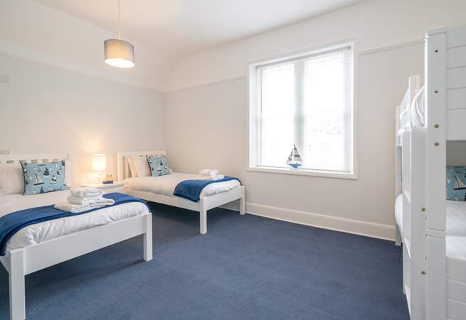 The third bedroom on the second floor is ideal for the younger ones offering twin beds and bunk-beds.