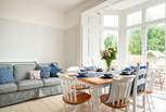 This spacious room has doors opening out onto the garden, ideal for family meals on those sunny days.