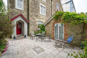 There is a pretty patio area located at the front of the property.