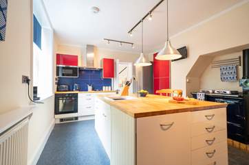 You will simply adore the large well-equipped kitchen.
