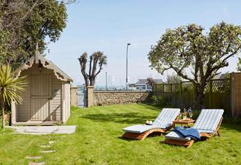 Enjoy your holiday on one of the sun loungers in the secluded garden or walk through the back gate and head to the beach.