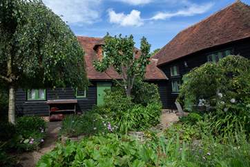 The paths in the courtyard lead to the other cottages so great if you decide to book the other cottages with family or friends.