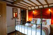 The bedroom has been dressed with 100% Egyptian cotton linen for that extra touch of luxury.
