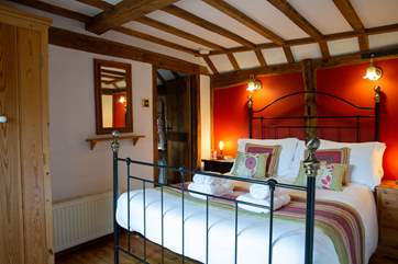 The bedroom has been dressed with 100% Egyptian cotton linen for that extra touch of luxury.