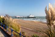 Take a walk in Eastbourne and visit the pier.