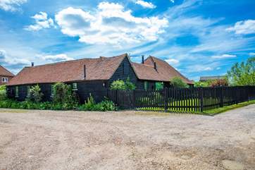 As you drive in The Byre is the cottage on the left and opposite is a parking bay.