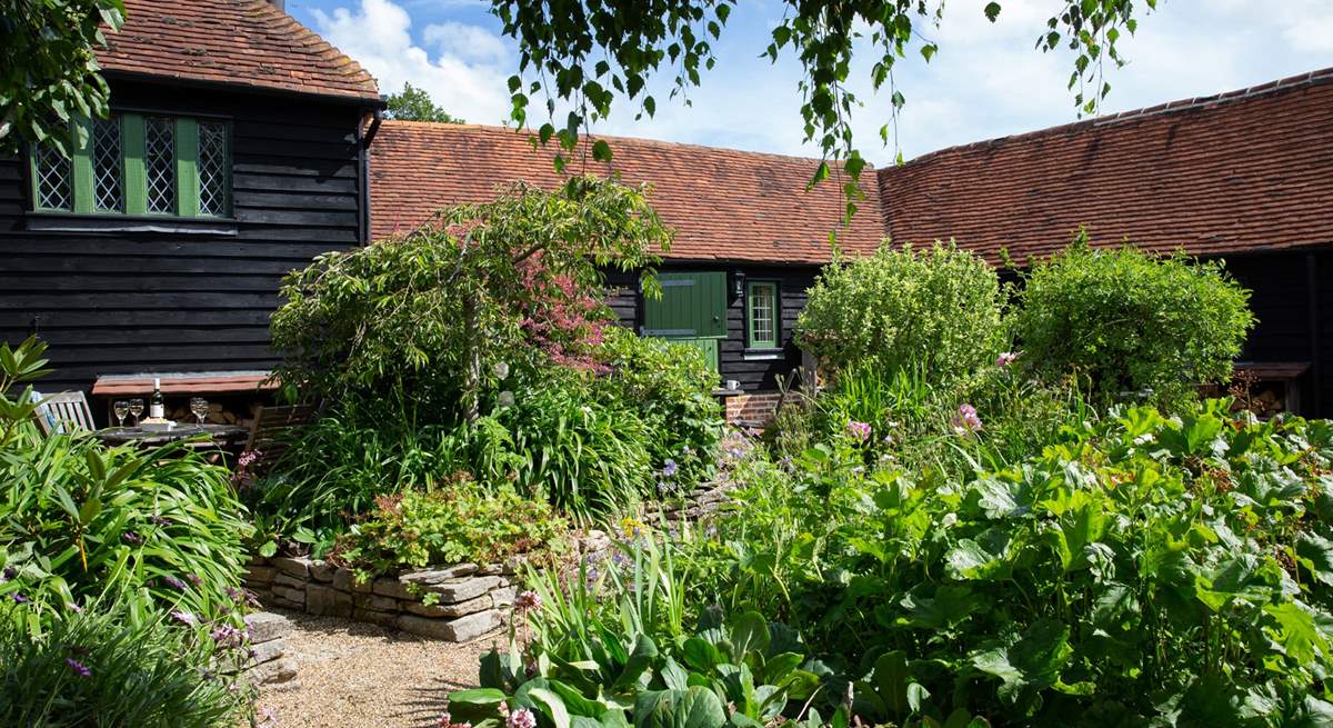 The paths in the courtyard lead to the other cottages so great if you decide to book the other cottages with family or friends.