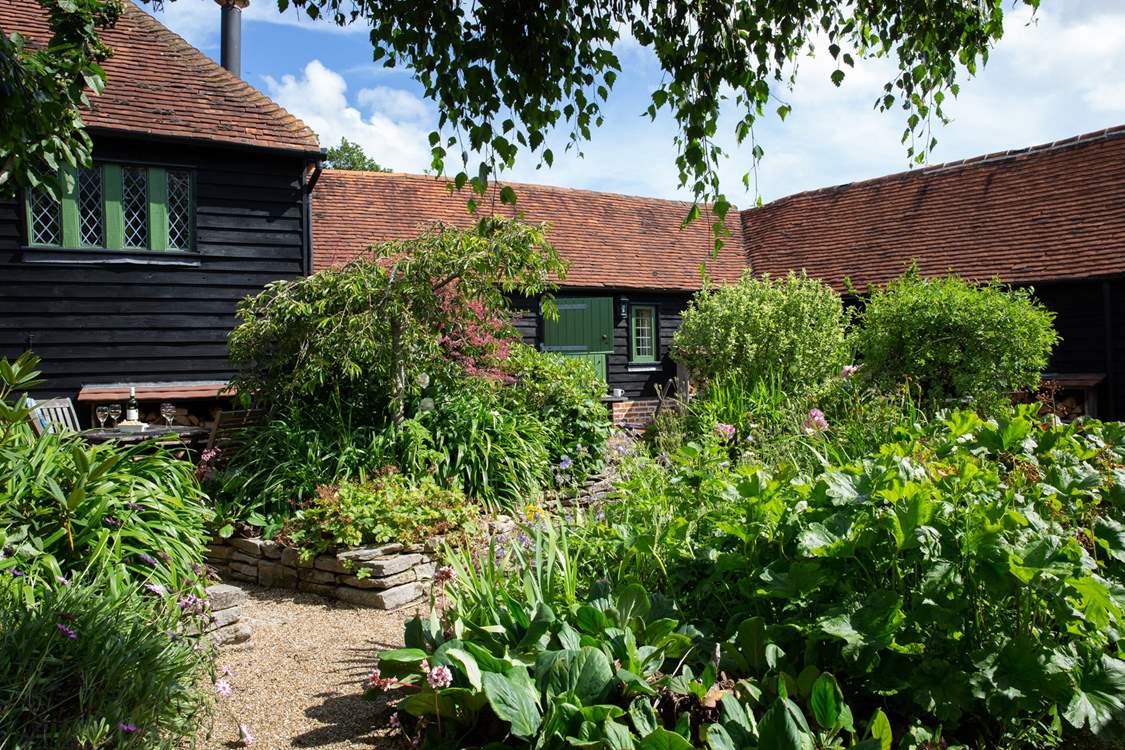 The paths in the courtyard lead to the other cottages so great if you decide to book the other cottages with family or friends.